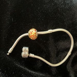 Pandora charm bracelet with Murano glass charm .925 purchased in Italy